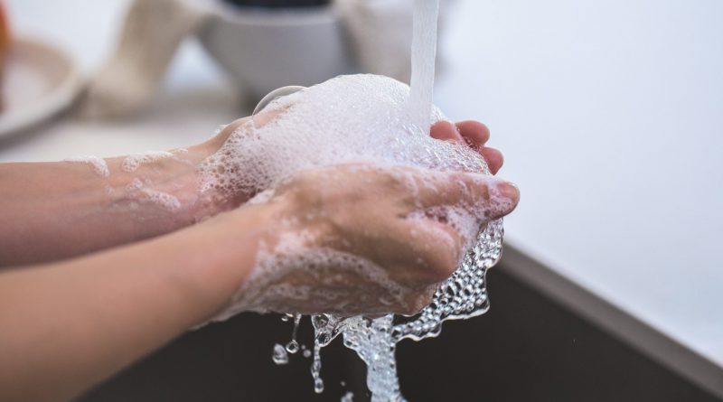 person-washing-hands
